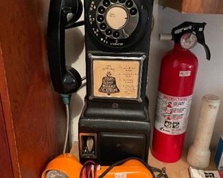 Old 5 cent pay phone! Keys at register.