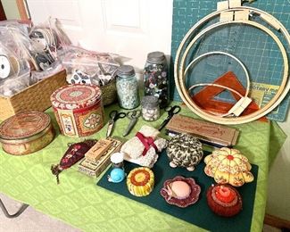 Button collection, pin cushions, sewing supplies