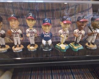 Atlanta. Braves signed bobble heads (7); Maddox, Glavine, Smoltz ,  “Chipper”, Andrew Jones, Gary Sheffield,and Bobby Cox. Custom case   1500.00