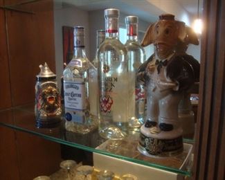 Stein, liquor bottles