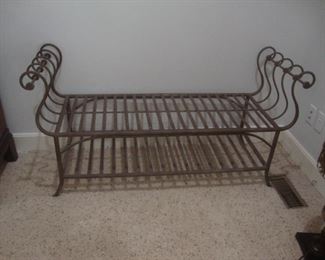 Iron bench with rolled arms