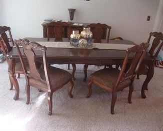 Ashley Furniture dining table with 6 chairs