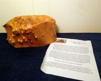 Tree root bowl with paperwork 