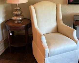 One of two upholstered chairs