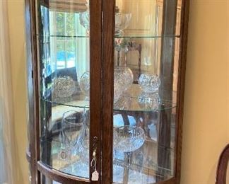 Curved front curio cabinet