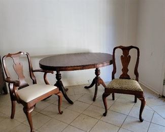 Dining Table in the Regency Style.
Solid Cherry Dining Chairs, 2 arm & 8 side by Henkel Harris.