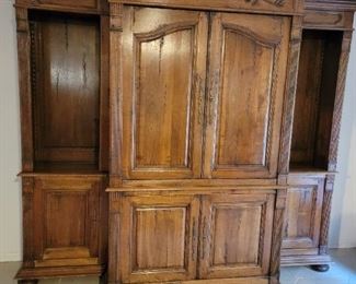 Bench Made Bookshelf/Wall System in the style of Louis the XV. This hand carved cabinet measures 7'4" x 6' x 32".