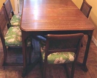 Wood Everyday Kitchen Table with 6 cane back chairs & 3 leaves