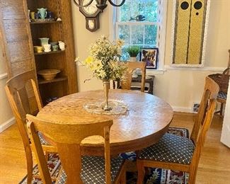Antique oak pedestal table and 6 chairs, comes  with extra leaves.