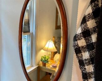 Antique oval mirror.