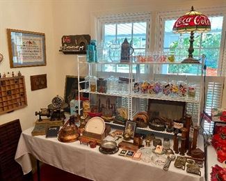 Tables full of vintage and antique smalls.