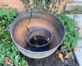 Cast iron cauldrons.