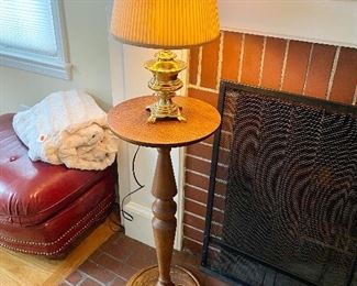 Antique oak plant stand with pretty brass lamp.