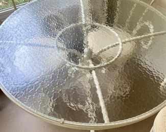 Vintage wrought iron and glass table and chairs, has only been indoors.