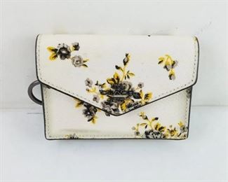 Coach floral mini purse/mini wallet brand new without tags with authentication $35
Bin#1