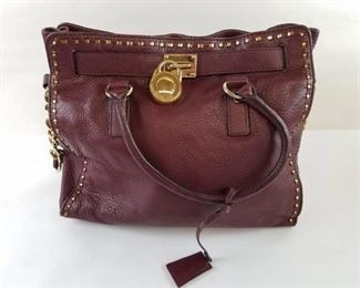 Michael  Kors pebble leather handbag with authentication $45
Bin#1