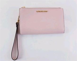 Michael Kors wristlet  brand new without tags with authentication $25
Bin#2