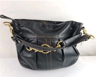 Coach black soft  leather purse in real nice used condition.  No flaws with authentication $40
Bin#8