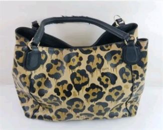 Coach leather spotted print handbag.  Poor handles $35
Bin#7