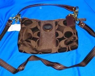 Coach small handbag brand new with tags $75
Bin#2