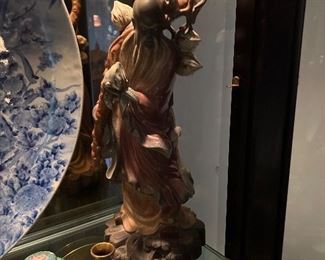 LLadro Asian man with Flowers