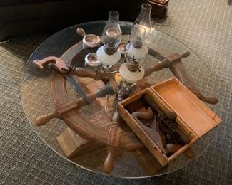 Glass top ships wheel coffee table 