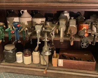 Meat grinders, various crocks, butter churn containers