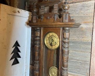 Elaborate wall clock with carved horse