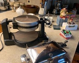 Vintage waffle iron and new waffle iron 