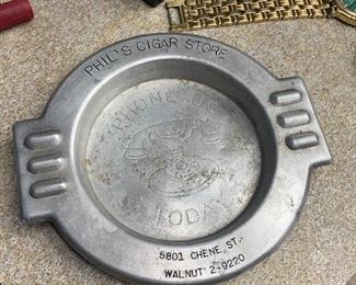 Vintage cigar store advertising ash tray. Antique phone