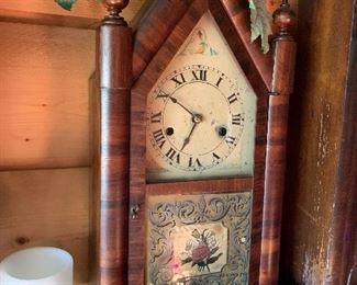 Antique reverse painted E.N. Welch steeple clock 
