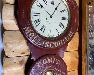 Vanner & Prest's Molliscorium Compo Embrocation.  Very rare and early figure 8 advertising wall clock made in England. Great original condition