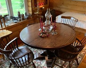 Oak table with 4 chairs and extra leaves 