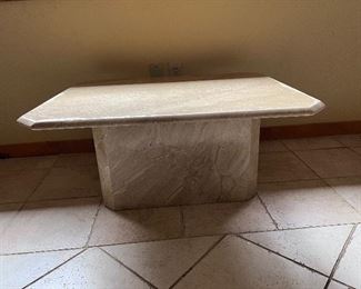 Item #6.                                                                                                   Beige colored marble coffee table.                                                      34" length x 28" width x 16" height

$100