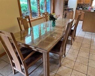 Item 11.                                                                                          
Dining room set - 6 chairs. Glass top not included
108” length x 44” width x 31” height 