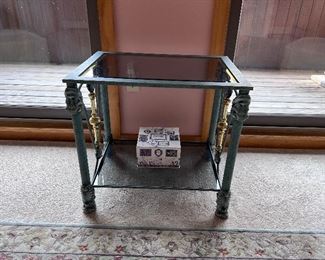 Item 19.                                                                                                 
small green glass table with golden details                          
24" length x 18" width x 22 1/2" height
$ 75