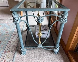 Item 19.                                                                                                 
small green glass table with golden details                          
24" length x 18" width x 22 1/2" height
$75