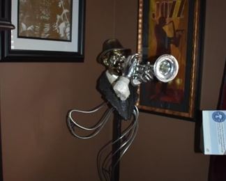 Awesome Lighted Ultra Modern Stand of Jazz Trumpet Player plus framed photographs of Elvis Presley and a Jazz Sax player on the wall behind