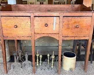 Heart pine huntboard with gallery and three drawers. Traces of old blue paint. Origin South Carolina.