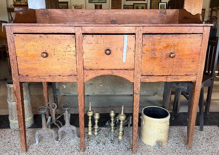 Heart pine huntboard with gallery and three drawers. Traces of old blue paint. Origin South Carolina.