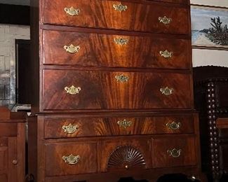 Eighteenth century two-piece Queen Anne highboy with
bonnet top.