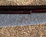 Southern flintlock “CHUNK GUN” Kentucky rifle with iron mountings and iron sunshade. This type of rifle was rested on a log for high accuracy shooting contests. Weighs 28 POUNDS!