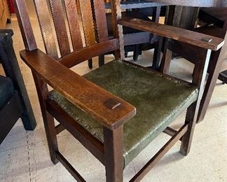 3 L & JG Stickley arm chairs. One retains original label. 