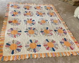…..Vintage Dresden Plate Quilt with attractive pedal border.  Hand Quilted, some slight wear and a few small stains.  Measures: 80” x 64” (001)