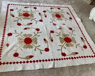 ..Dated 1884/1889 Rose of Sharon Type Antique Hand Quilted Quilt.  Also signed but can’t quite make it out.  Incredible shell and feather quilting, some fading, binding is good.  Measures: 73” x 75” (005)