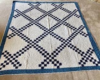 ..Double Irish Chain Navy Antique Hand Quilted Quilt.  Calico Border, Slight wear on the binding, few tiny stains, hand pieced, some slight shredding.  Measures: 73” x 65” (007)