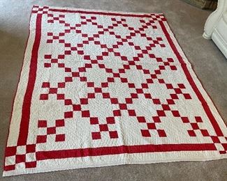 ………..Red and White Irish Chain Quilt.  Hand quilted, few small stains, part of the binding has been replaced.  80” x 64” (013) 