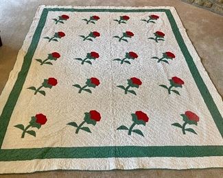 …..Vintage Hand Quilted and Hand Appliquéd Quilt.  Few small spots, one rose bottom right corner slightly faded, great shape.  Measures: 92” x 76 1/2” (018)