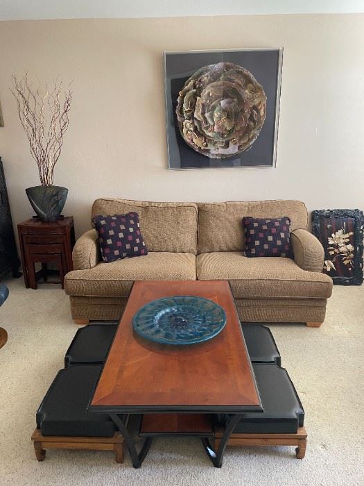 Twill two cushion sofa, coffee table, Japanese low benches and a mixed media floral collage.