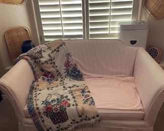 Charming slip-covered loveseat